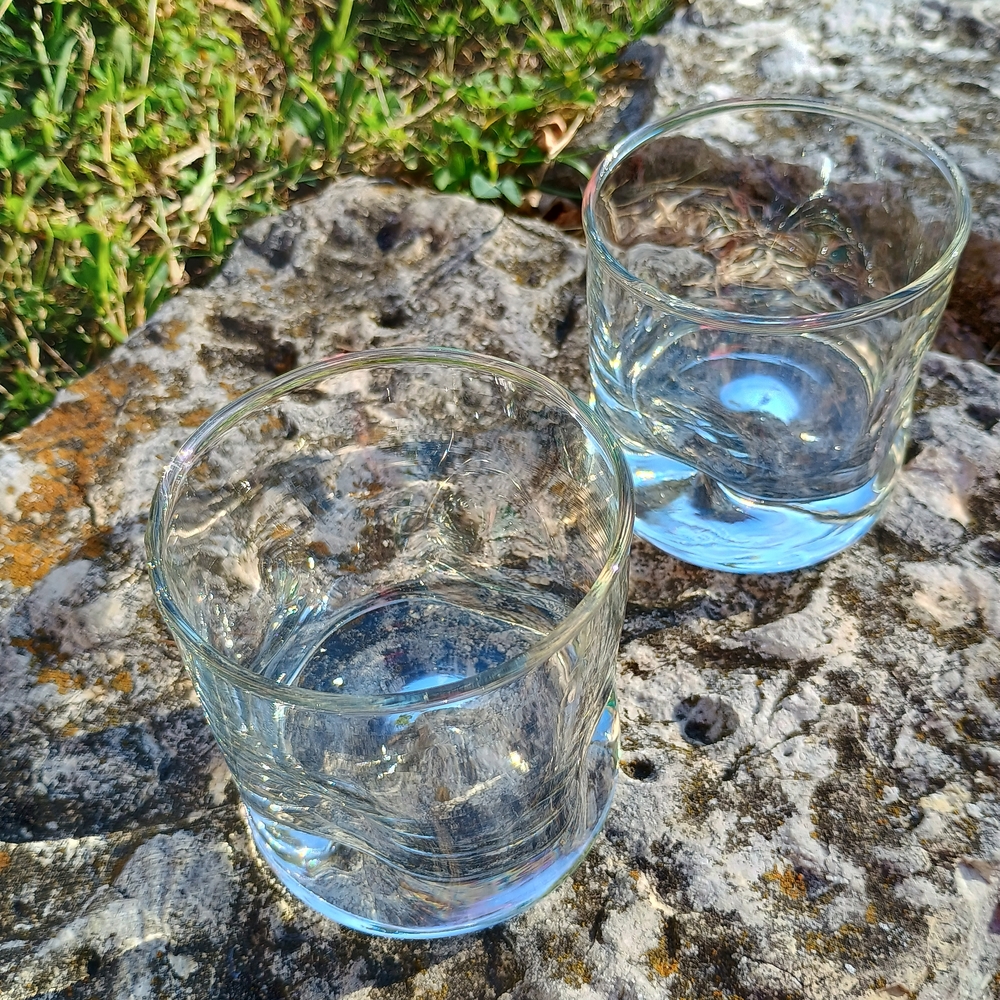Set of two (2) mid-century, thick based warbled or dimpled whiskey glasses